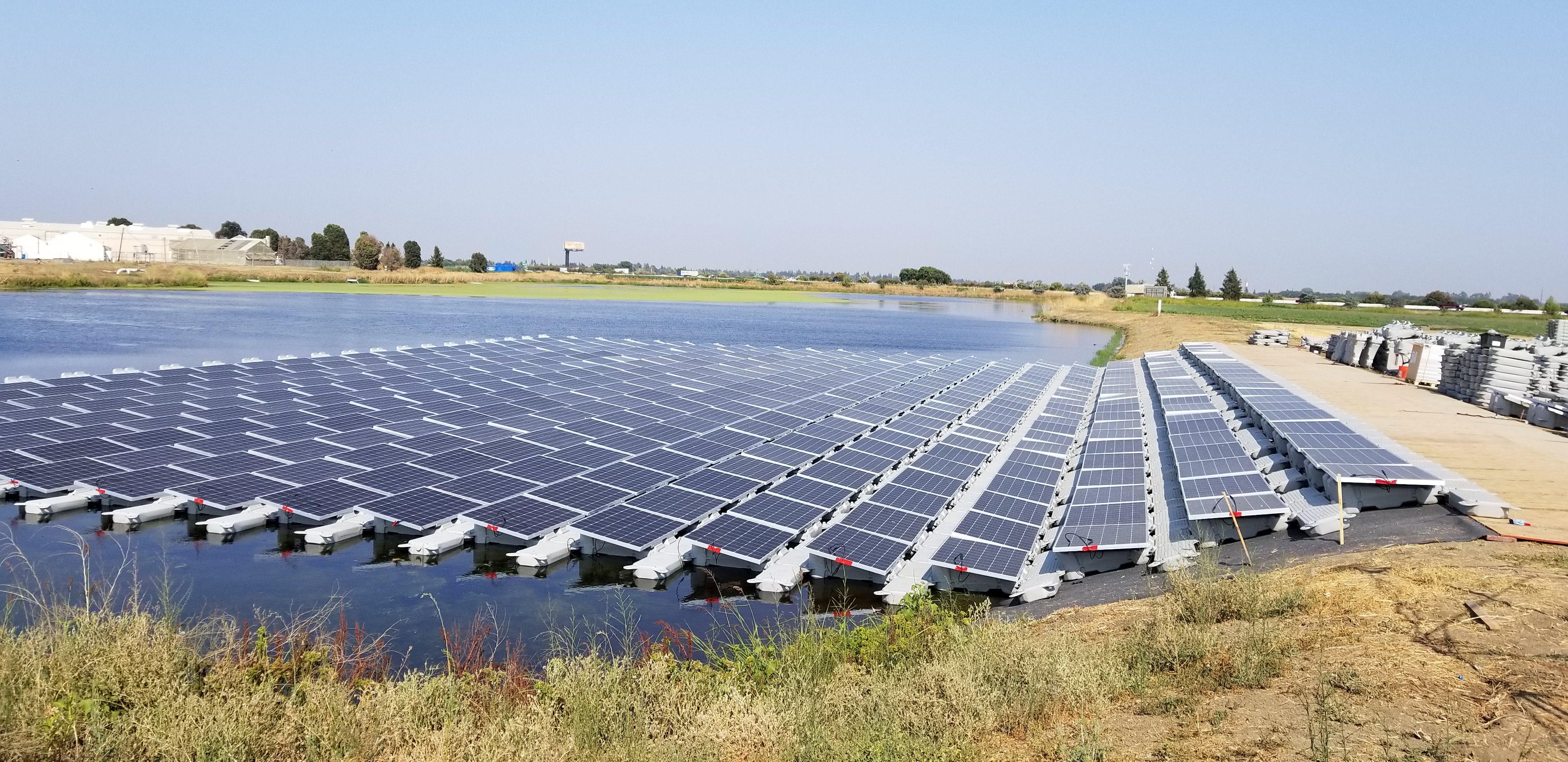 Floating Solar Array installed on an irrigation pond for Salad Cosmo